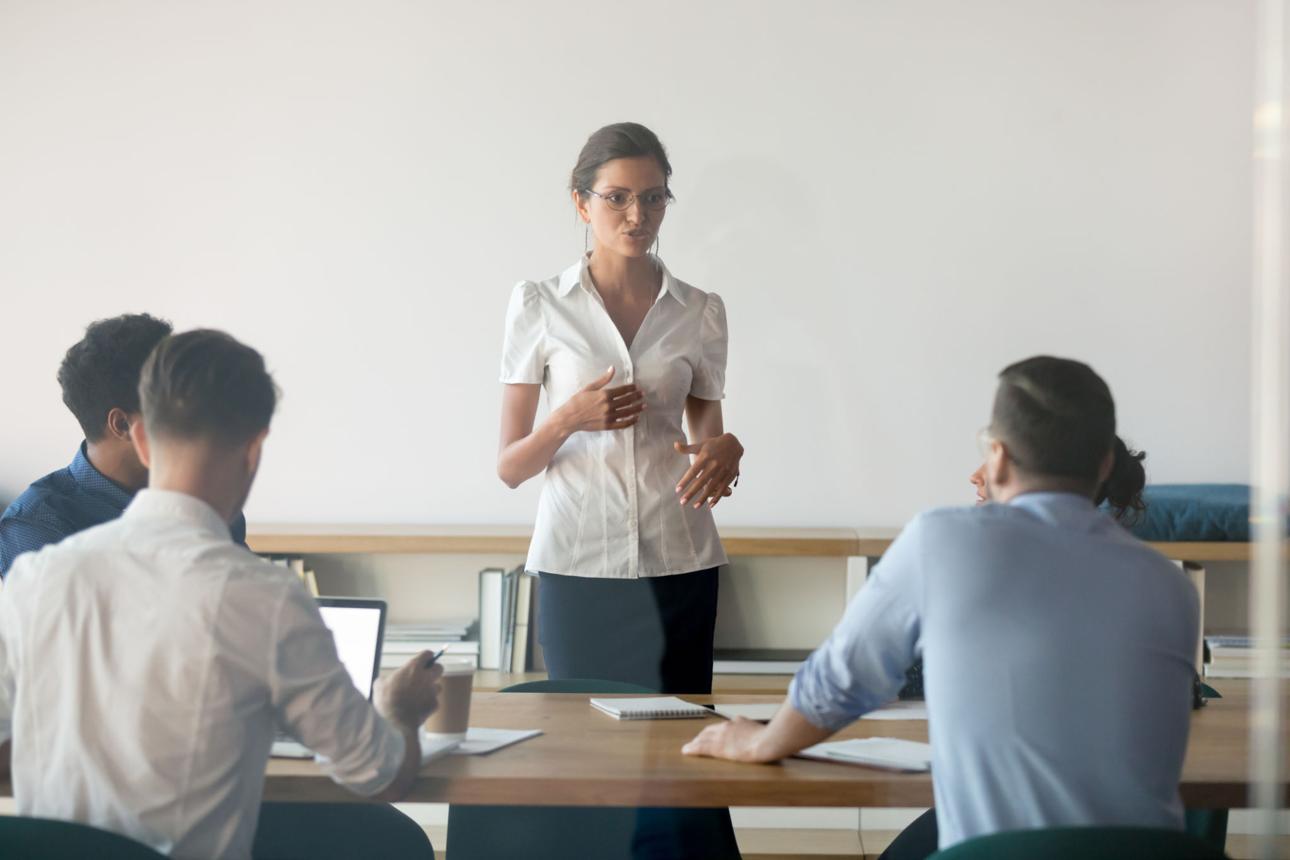 Online MBA learner demonstrating confidence through a professional podcast appearance